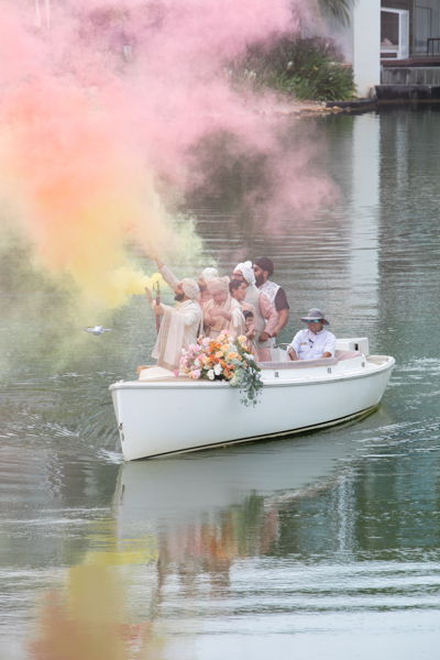 A boat with people on it in the water.