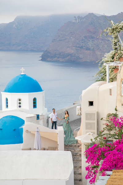 A couple walking on the steps of an island