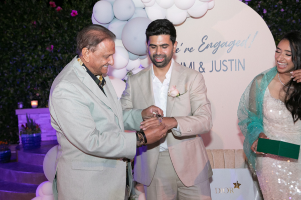 sachin and babi light blue dress Tips for Dressing for an Engagement main image 1
